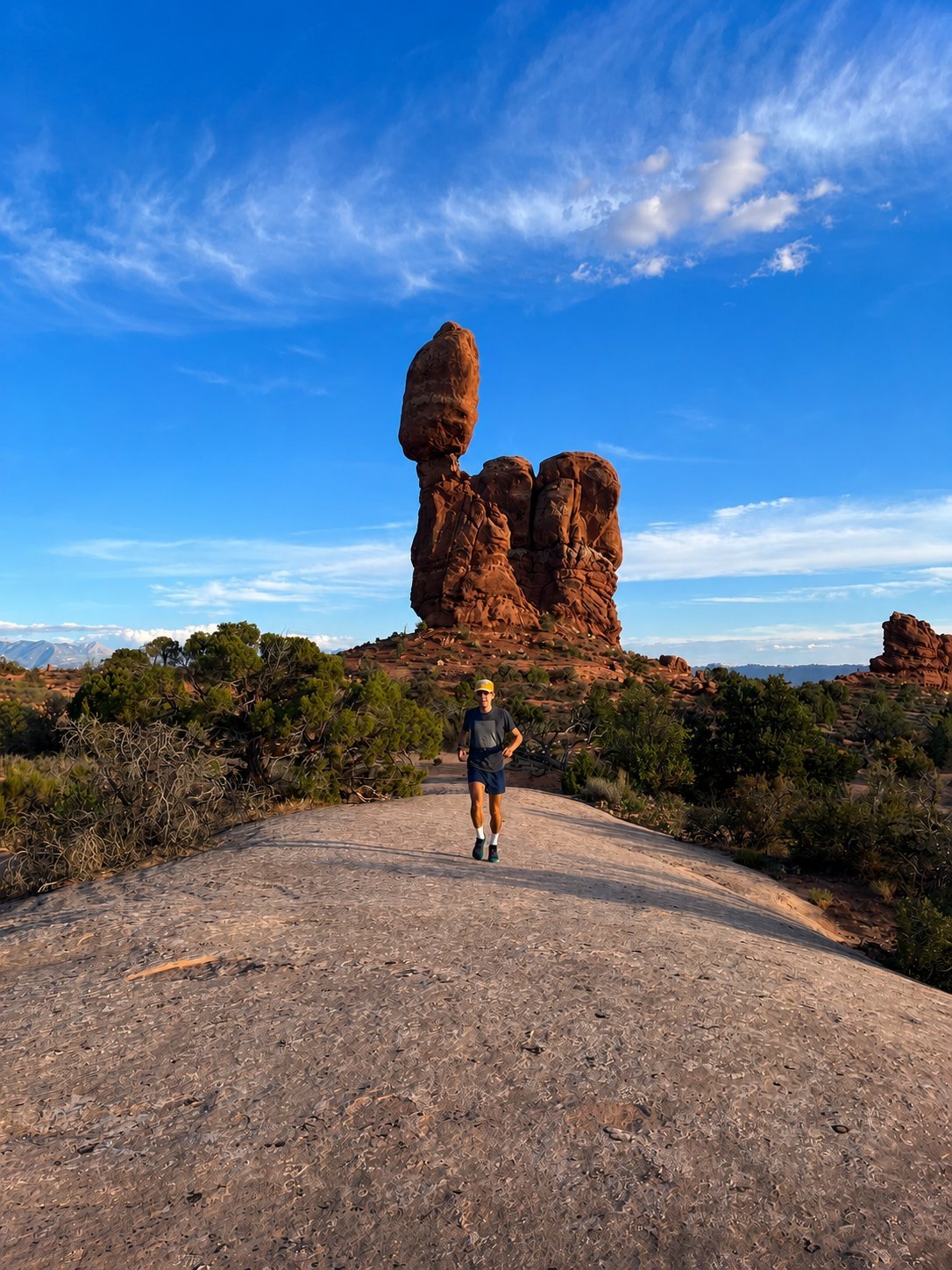 Max running on a desert trail